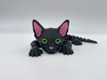 Подвижная игрушка &laquo;Котик Сфинкс&raquo; Черный &ndash; Новая версия, глаза Зеленые CATNEW-003 фото