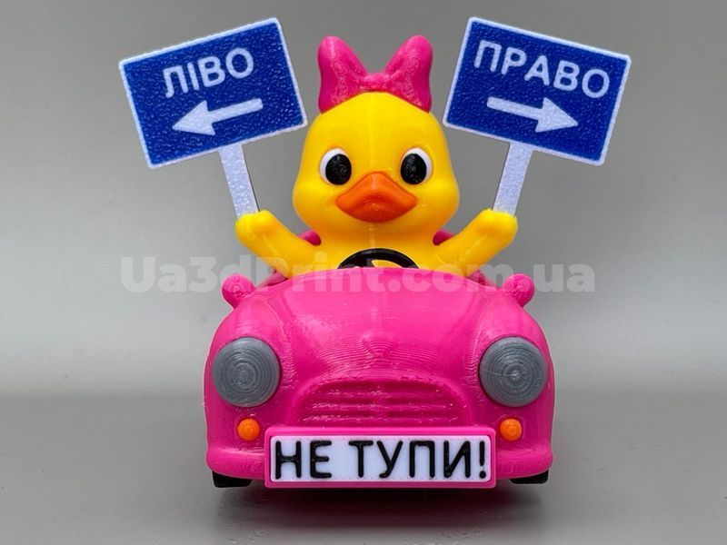 Качка-дівчинка в рожевому авто &laquo;Ліво-Право&raquo; на торпеду DUCKAUTO-001 фото